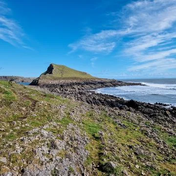 Worm's Head is a tidal island located on the Gower Peninsula in South Wales.. Stock-Fotos