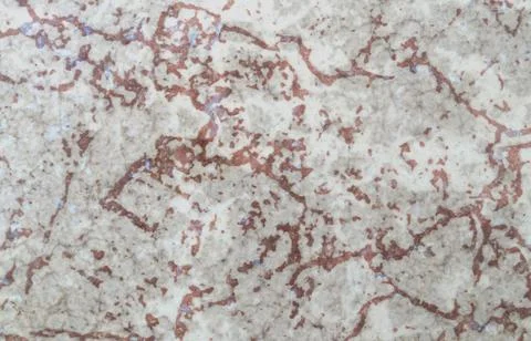 Worn, aged, rough surface texture with red color veins Stock Photos