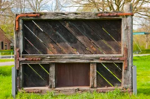 Worn and torn lock gate of a sluice Stock Photos