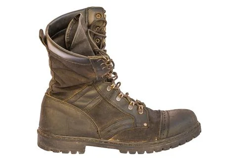 Worn Black Combat Boot Isolated on White Background Stock-Fotos