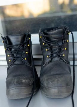 Worn boots Stock Photos