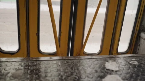 Worn bus door with textured surface. Detailed view of urban bus entry and wear Stock Footage 333176822