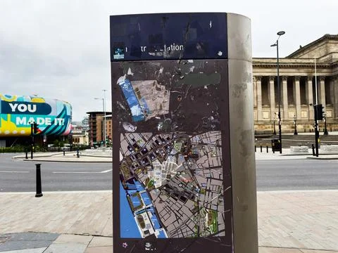 Worn city map information kiosk at a central station square in Liverpool, U.. Stock Photos