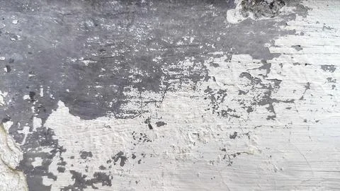 Worn concrete surface with horizontal cracks and structural imperfections, .. Stock Photos