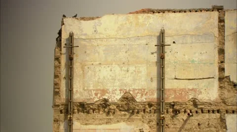 Worn down side of building Video stock 12761248