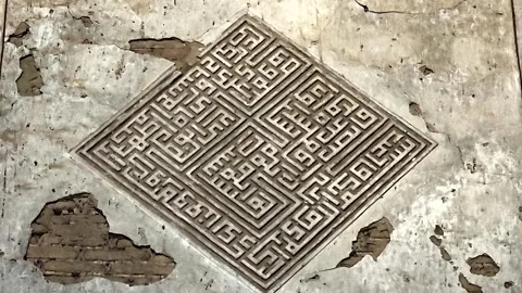 Worn inscriptions and wall ornament - Reflect Layered and Architectural Texture Stock Footage 339811643