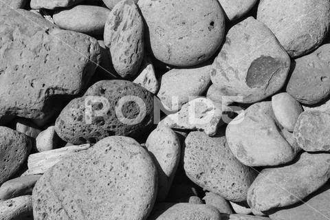 Worn lava pebbles on beach Waiʻānapanapa State Park Maui Hawaii Stock Photos