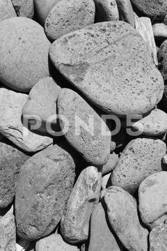 Worn lava pebbles on beach,Waiʻānapanapa State Park, Maui ,Hawaii Stock Photos