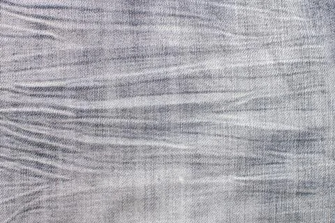 Worn low blue  jeans texture background closeup Stock Photos