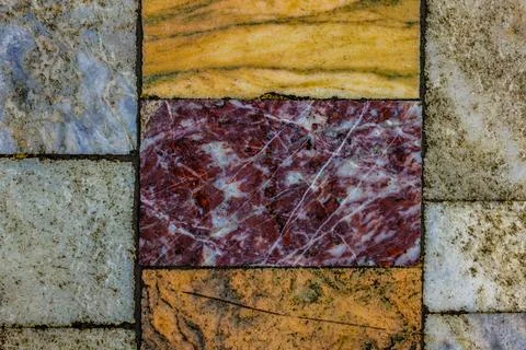 Worn Marble Floor Tile with Red, Yellow and White Tiles Photos