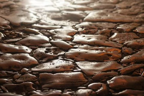 Worn marble pathway in sunlight Stock Photos