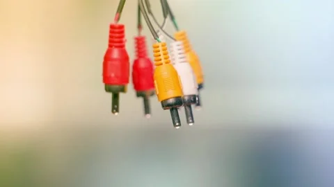 Worn old low-quality RCA connector tulips close-up on a blurred background Stock Footage 199272227