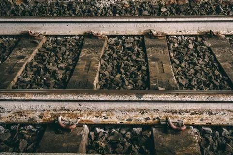 Worn Old Train Tracks and Stones Stock Photos