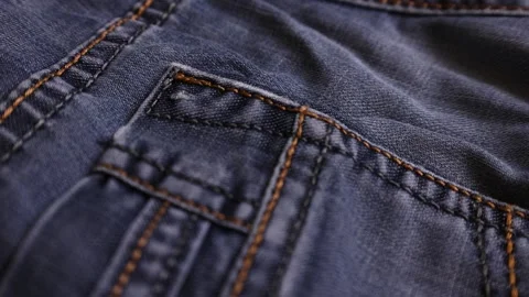 Worn or old jeans,denim double stitching close up on jeans,clothes,blue jeans te Stock Footage 307430495