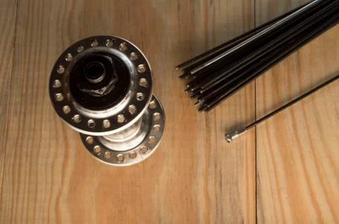 Worn-out bicycle bushing with spokes Stock Photos