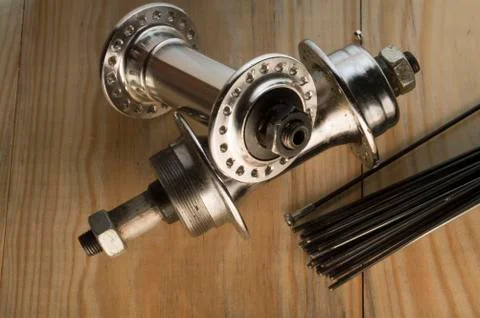 Worn-out bicycle bushing with spokes Stock Photos
