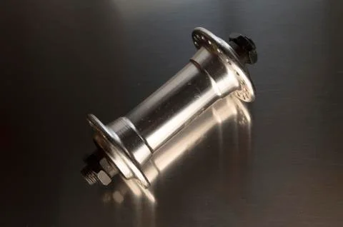 Worn-out bicycle bushing with spokes Stock Photos