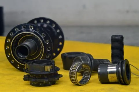 Worn-out bicycle bushing with spokes Stock Photos