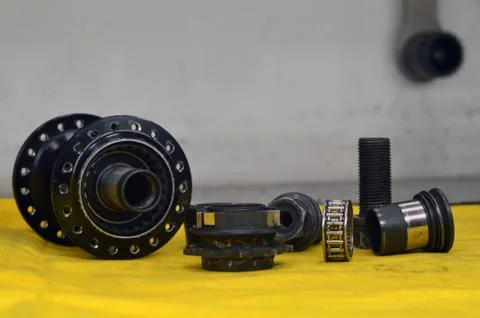 Worn-out bicycle bushing with spokes Stock Photos