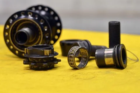 Worn-out bicycle bushing with spokes Stock Photos