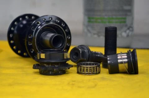 Worn-out bicycle bushing with spokes Stock Photos