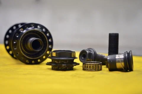 Worn-out bicycle bushing with spokes Stock Photos
