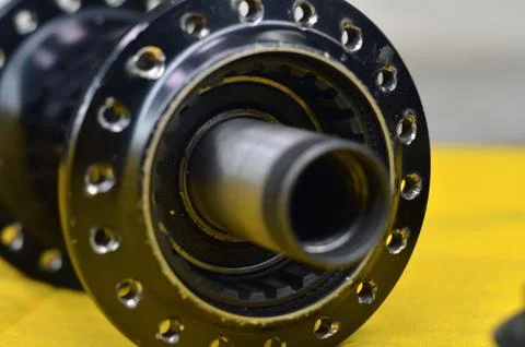Worn-out bicycle bushing with spokes Stock Photos