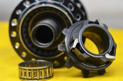 Worn-out bicycle bushing with spokes Stock Photos