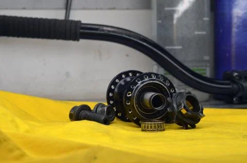Worn-out bicycle bushing with spokes Stock Photos