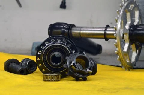 Worn-out bicycle bushing with spokes Stock Photos
