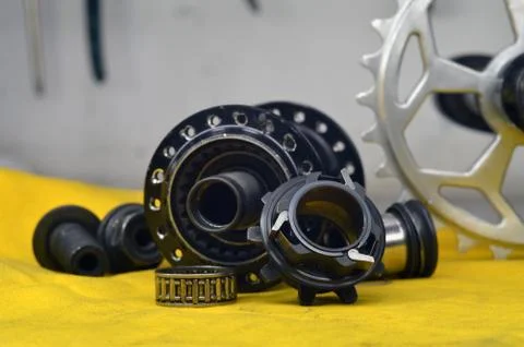 Worn-out bicycle bushing with spokes Stock Photos
