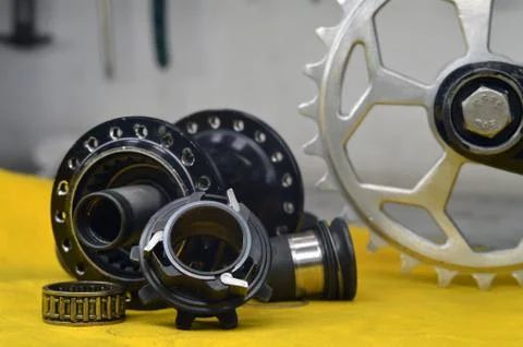 Worn-out bicycle bushing with spokes Stock Photos
