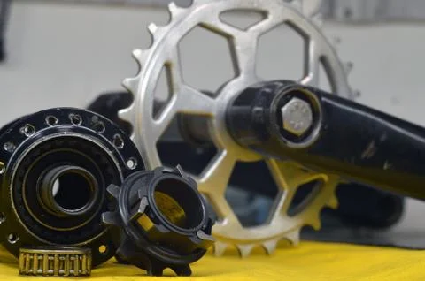 Worn-out bicycle bushing with spokes Stock Photos