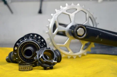 Worn-out bicycle bushing with spokes Stock Photos
