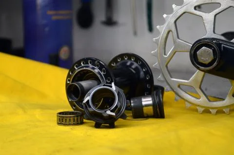 Worn-out bicycle bushing with spokes Stock Photos