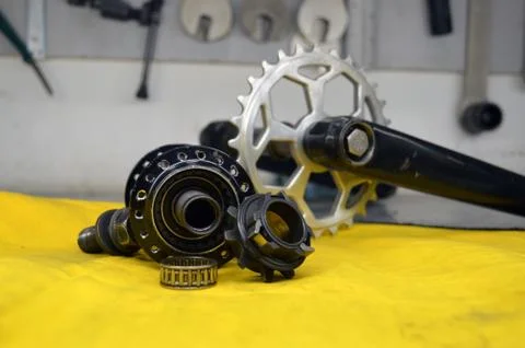 Worn-out bicycle bushing with spokes Stock Photos