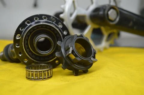 Worn-out bicycle bushing with spokes Stock Photos