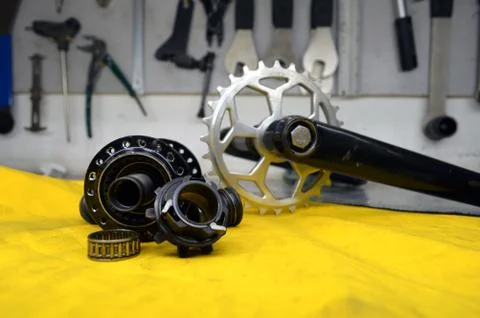 Worn-out bicycle bushing with spokes Stock Photos