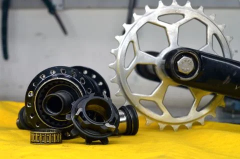 Worn-out bicycle bushing with spokes Stock Photos