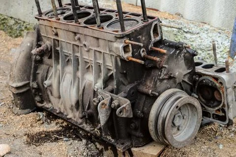 Worn out engine with a broken piston of an old car Stock Photos