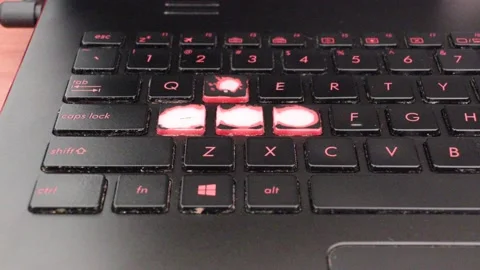 Worn out laptop computer keyboard during... | Stock Video | Pond5