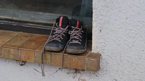 Worn out Warm Poor Kid Shoes Left Outdoor Stock Footage 261400795