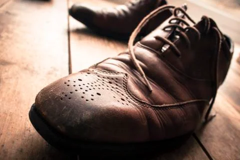 Worn pair of shoes Stock Photos