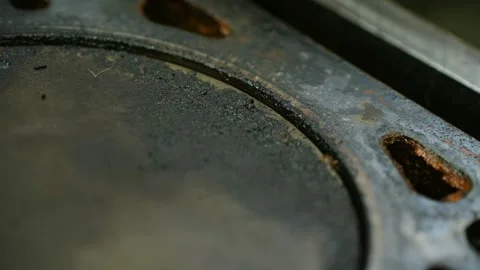 Worn piston surfaces coated with deposits reflect engine degradation; corroded Stock Footage 312846583