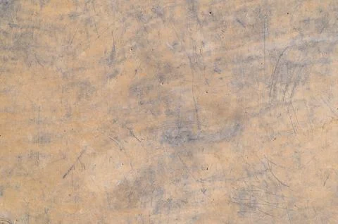 Worn plaster surface with subtle scratches and color variations Stock Photos