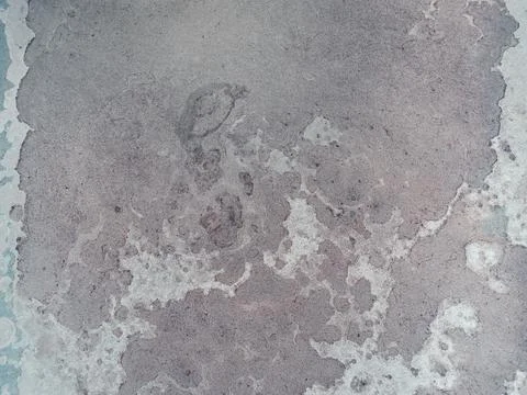 Worn rusty metal surface with paint cracking texture background. Foto stock