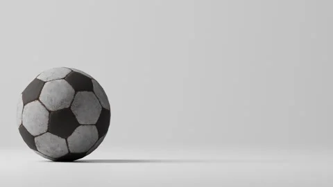 Worn soccer ball bouncing to frame edge Stock Footage 336315886