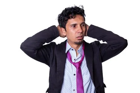 Worried and desperate businessman does not know what to do with the current Stock Photos