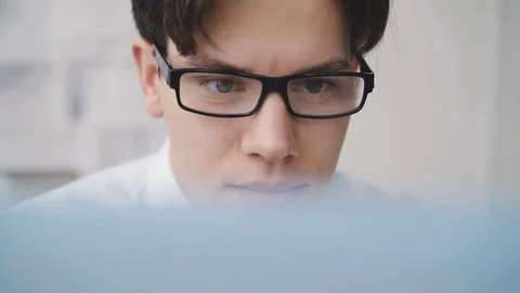 Worried businesman working diligently with computer in office. 4K Stock Footage 85116293