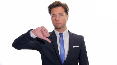Worried businessman gesturing thumbs-down Видео 45877386